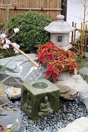 Backyard Japanese Garden with Stone Lantern and Water Fountain